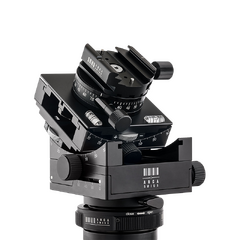 The Arca-Swiss Cube is a three-axis panoramic head that allows for finely calibrated gearless panning adjustments with tension control.