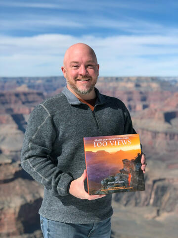 Adam with the Grand Canyon Centennial Book