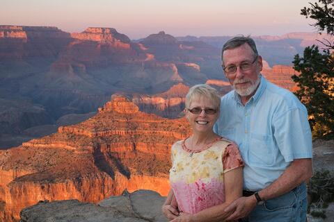 Portrait photograph of people on vacation at the Grand Canyon.