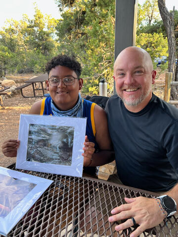 Adam with a Parks in Focus participant in 2022