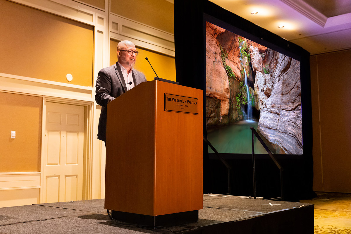 Photographer Adam Schallau as a keynote speaker at the 2023 Nature Photography Summit.