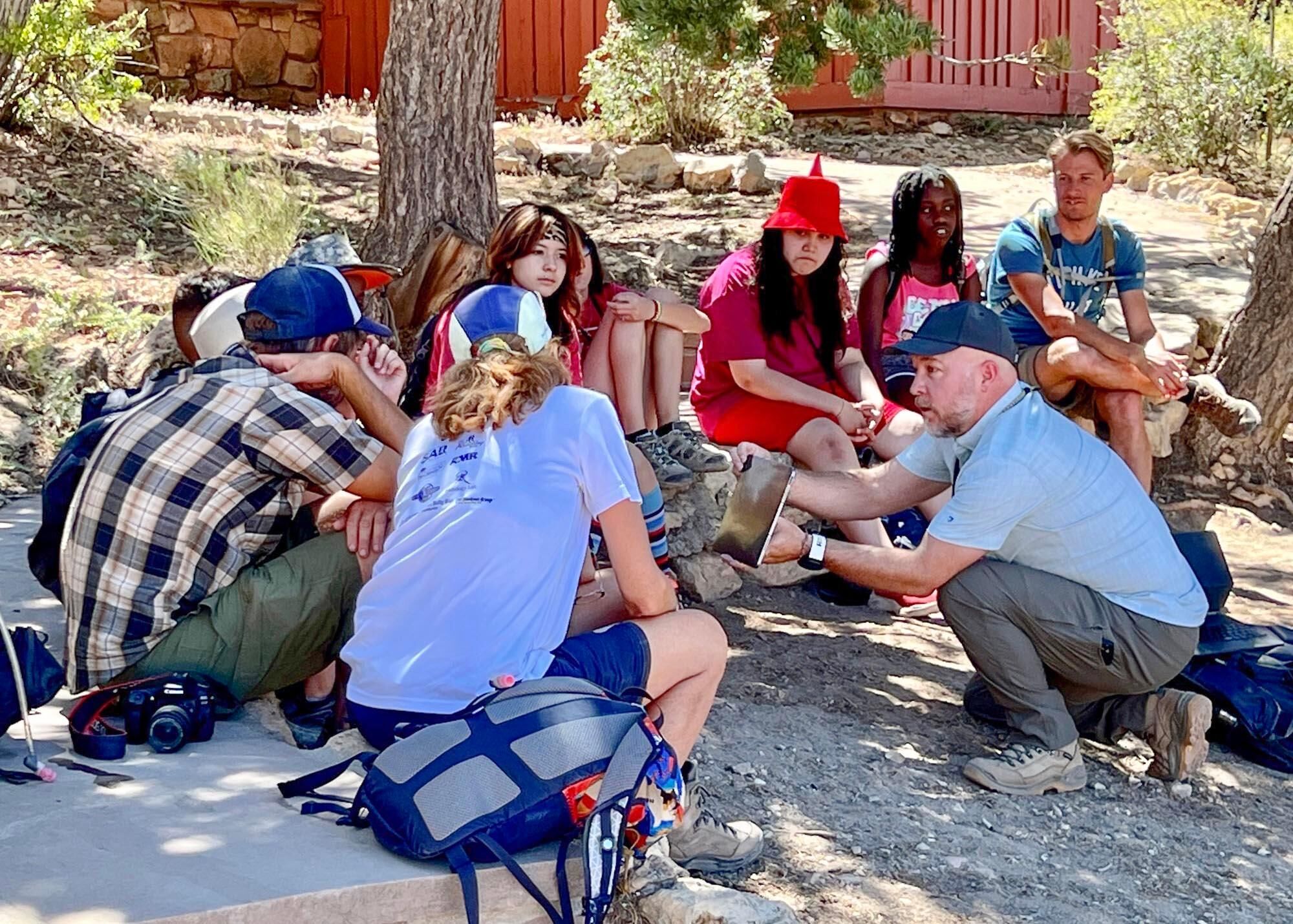 Adam Schallau working with kids at the Grand Canyon