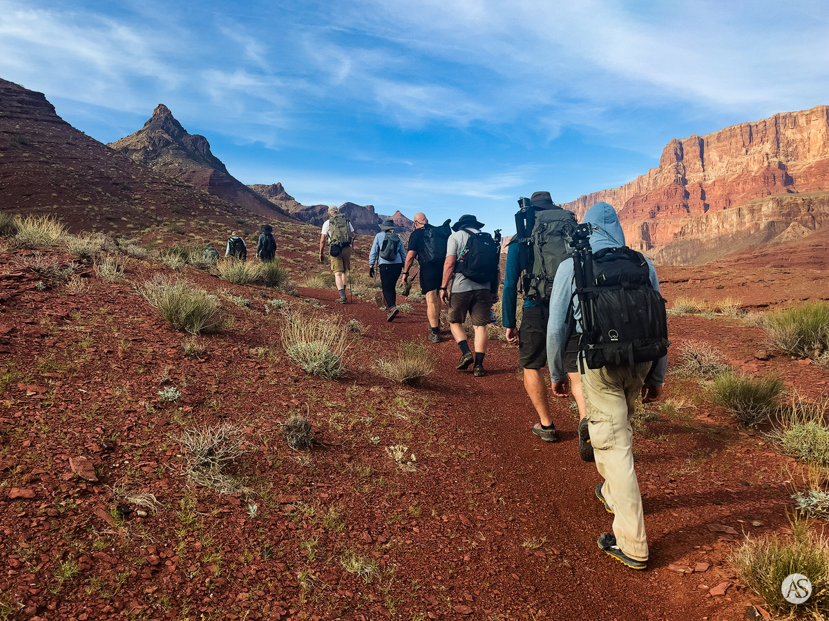 A group of photographers hiking in the Grand Canyon.