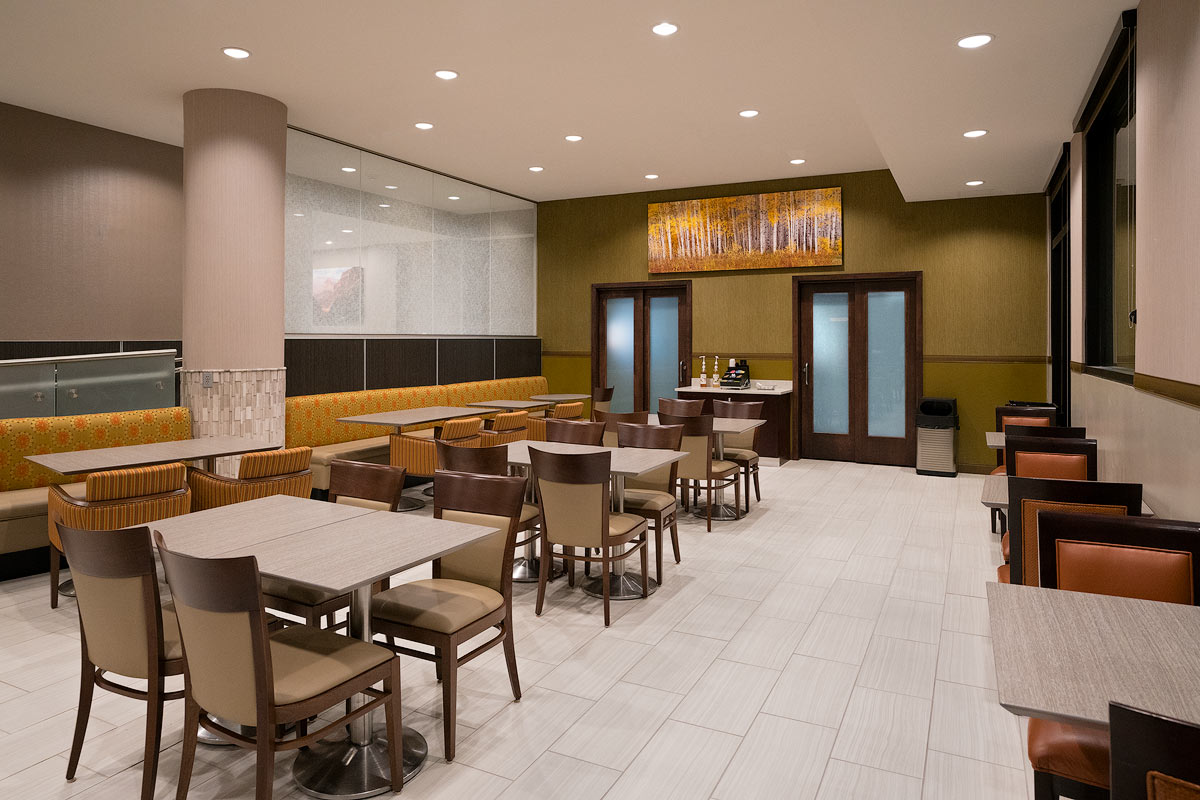 And finally, in the breakfast area is the big piece, printed to 96×36″ is Endless Splendor with its white aspen boles and...